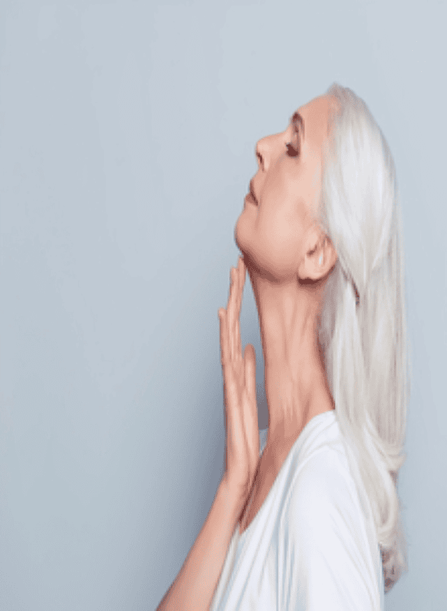 Older woman has a smooth looking neck after undergoing cosmetic surgery