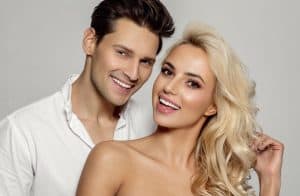 Happy, attractive couple is pleased with their rhinoplasty results.