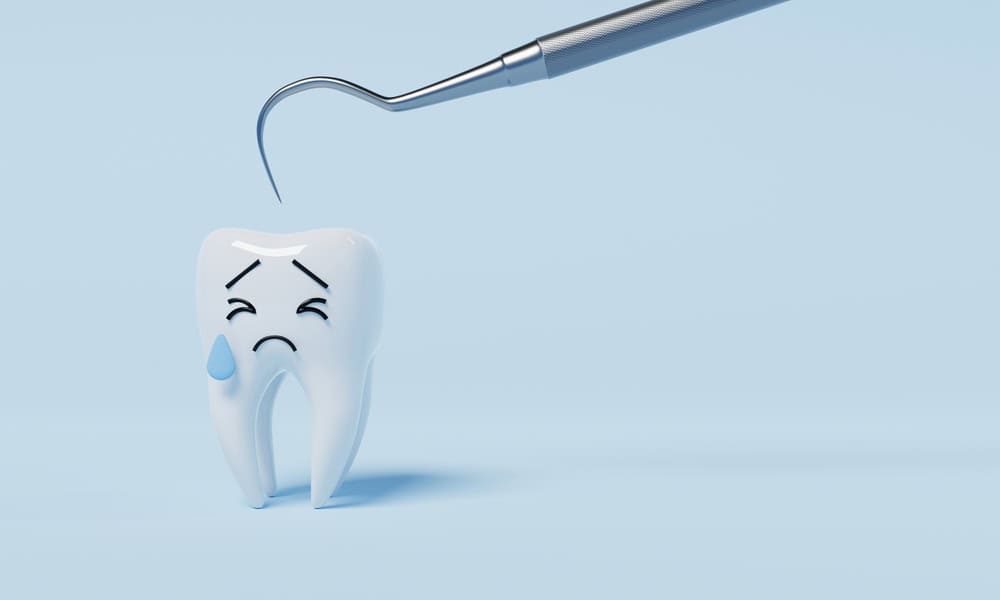 Cartoon of a sad tooth about to be inspected by a dentist - enamel protection is important.