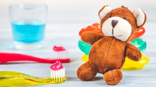 teddy bear and toothbrush