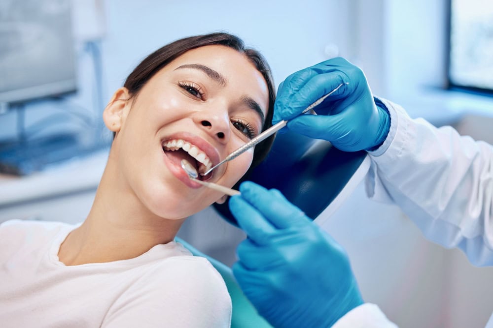Woman relaxing during sedation dental appointment in Seattle, Wa