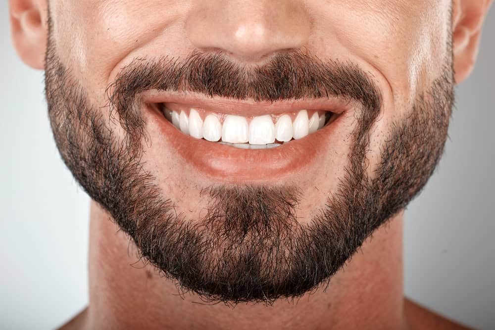 Man with healthy smile after gum recession treatment in Seattle, WA