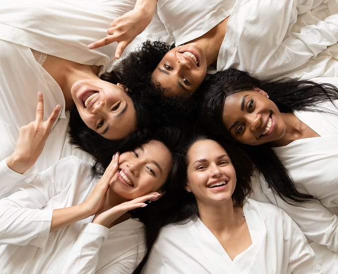 Top,View,Five,Diverse,Women,In,White,Bathrobes,Lying,In