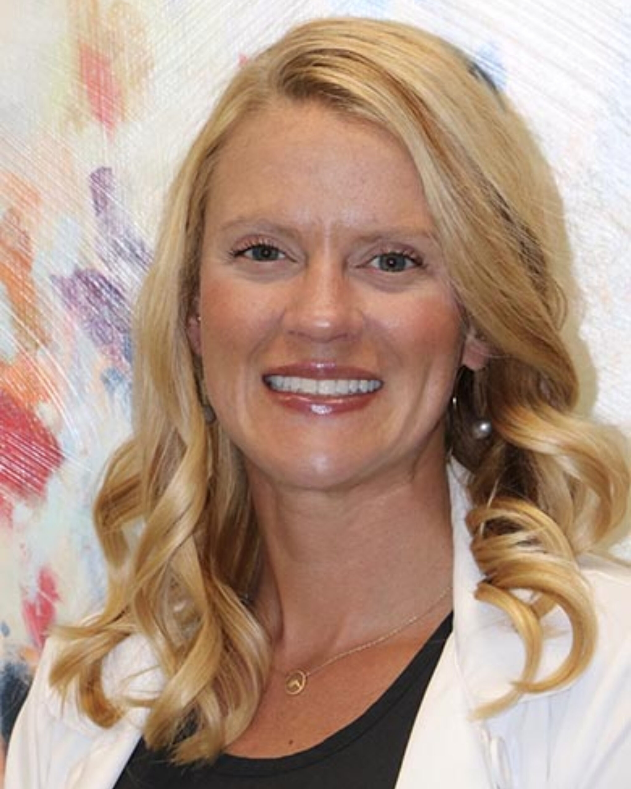 Minimalist white 'X' logo on a black background.